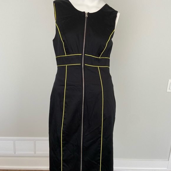 Knee length black dress with yellow accents - Picture 3 of 9
